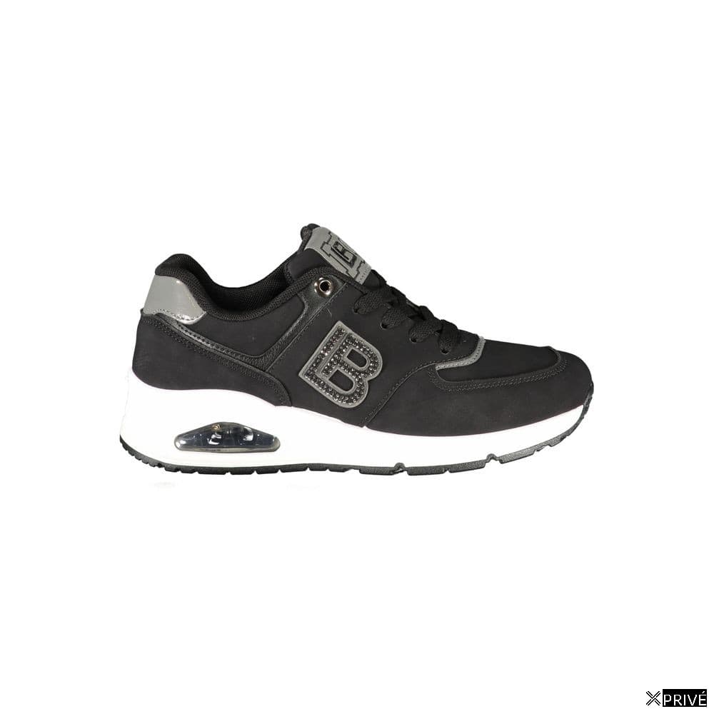 Chaussures de sport noires — 1