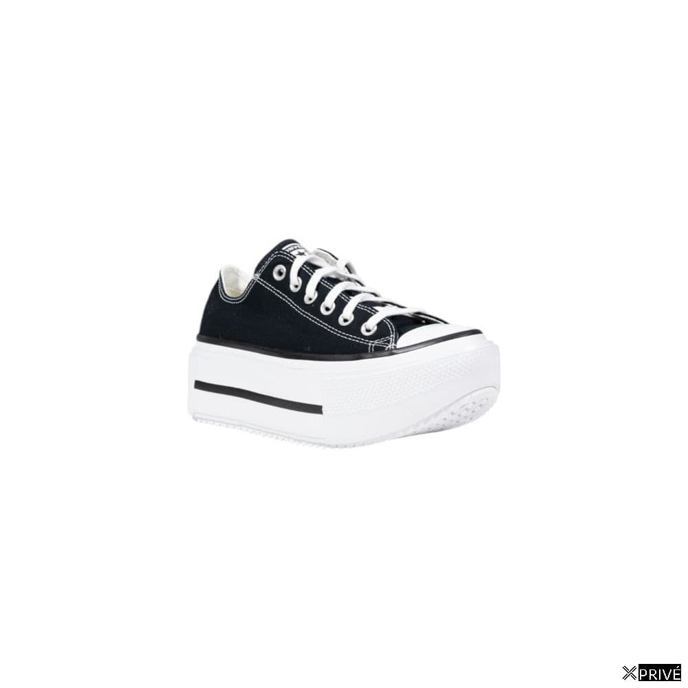 Chaussures de sport noir et blanc en Tissu — 2