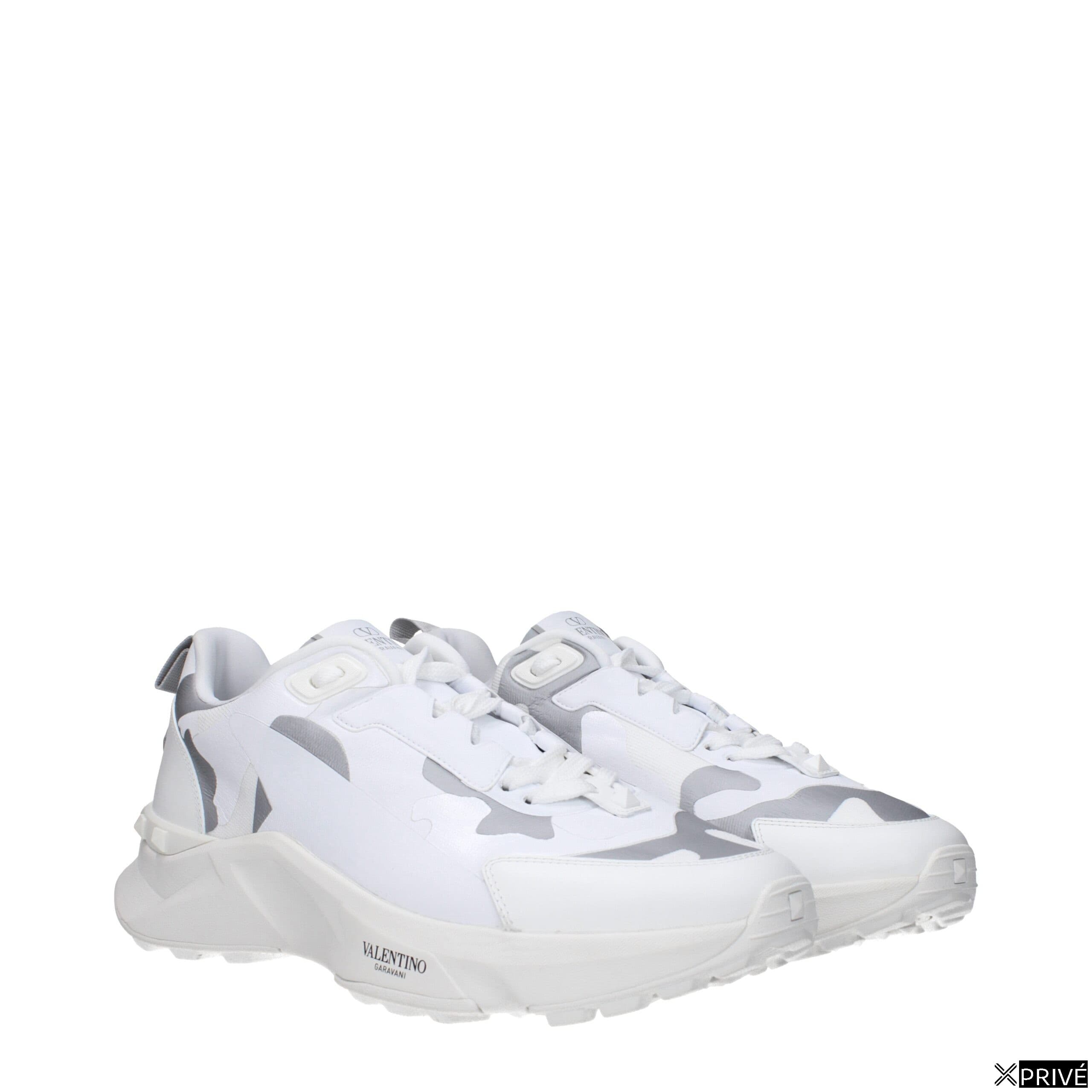 Chaussures de sport blanches en Tissu — 2