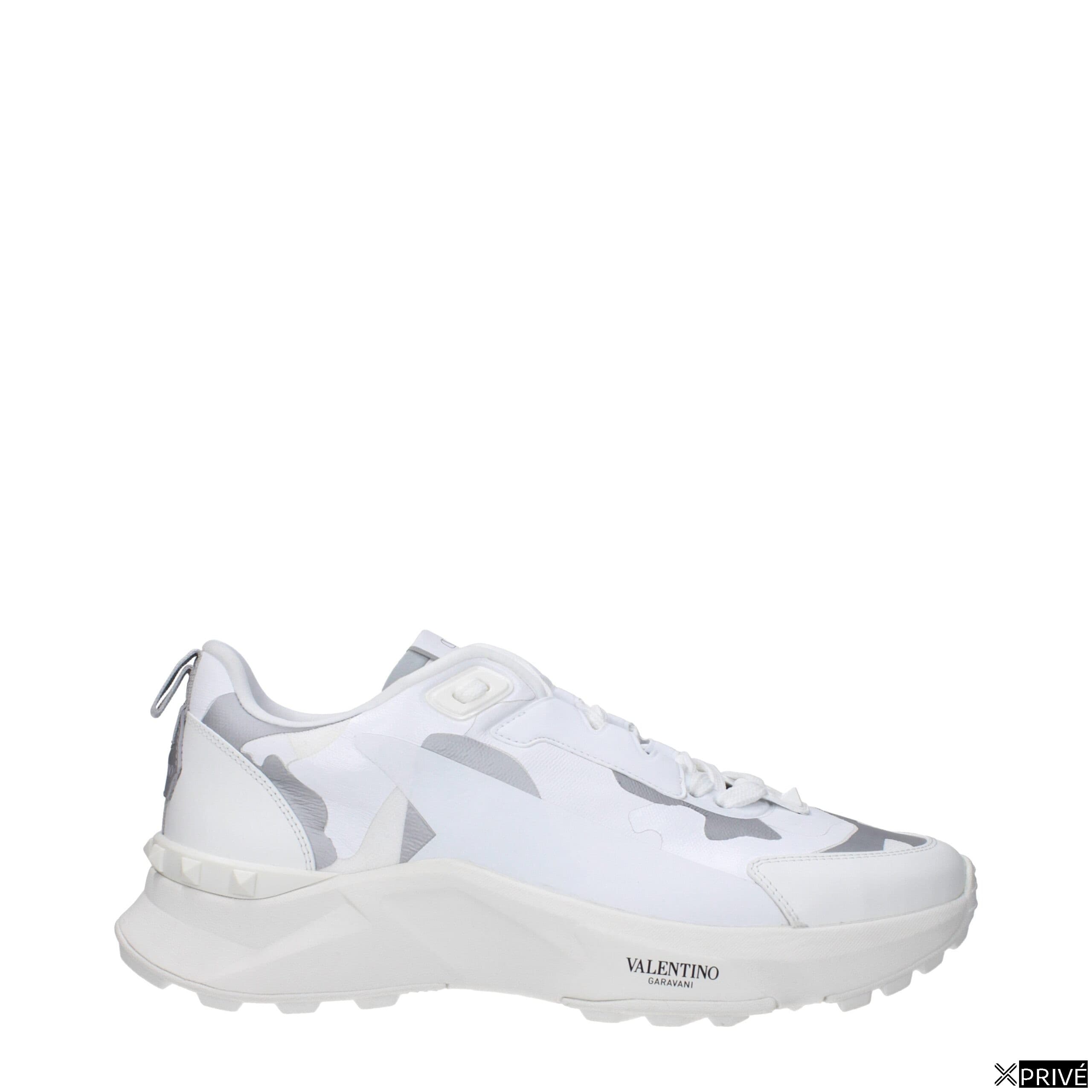 Chaussures de sport blanches en Tissu — 1