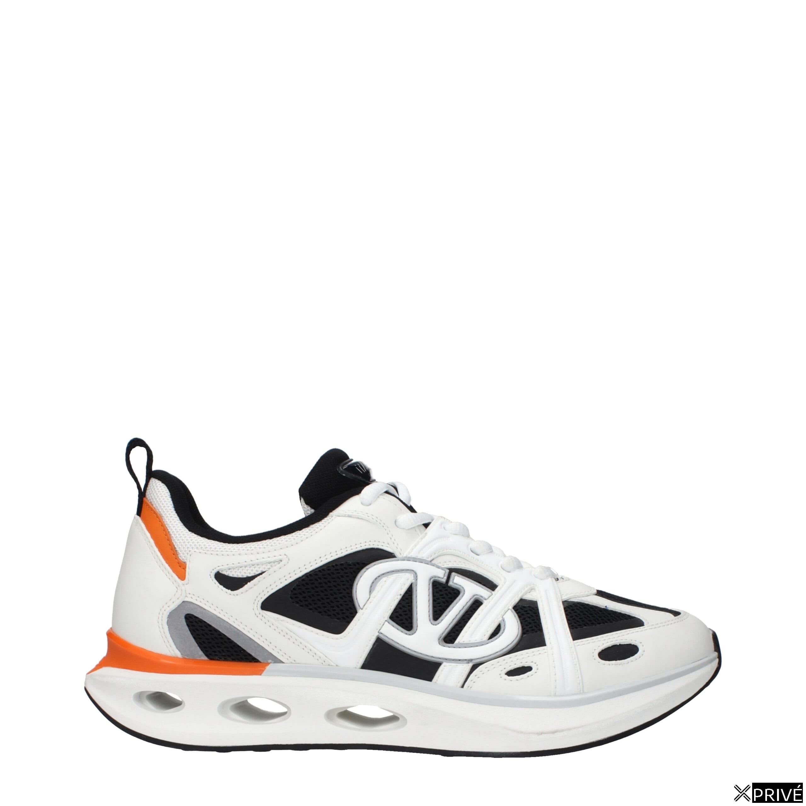 Chaussures de sport blanches en Tissu — 1