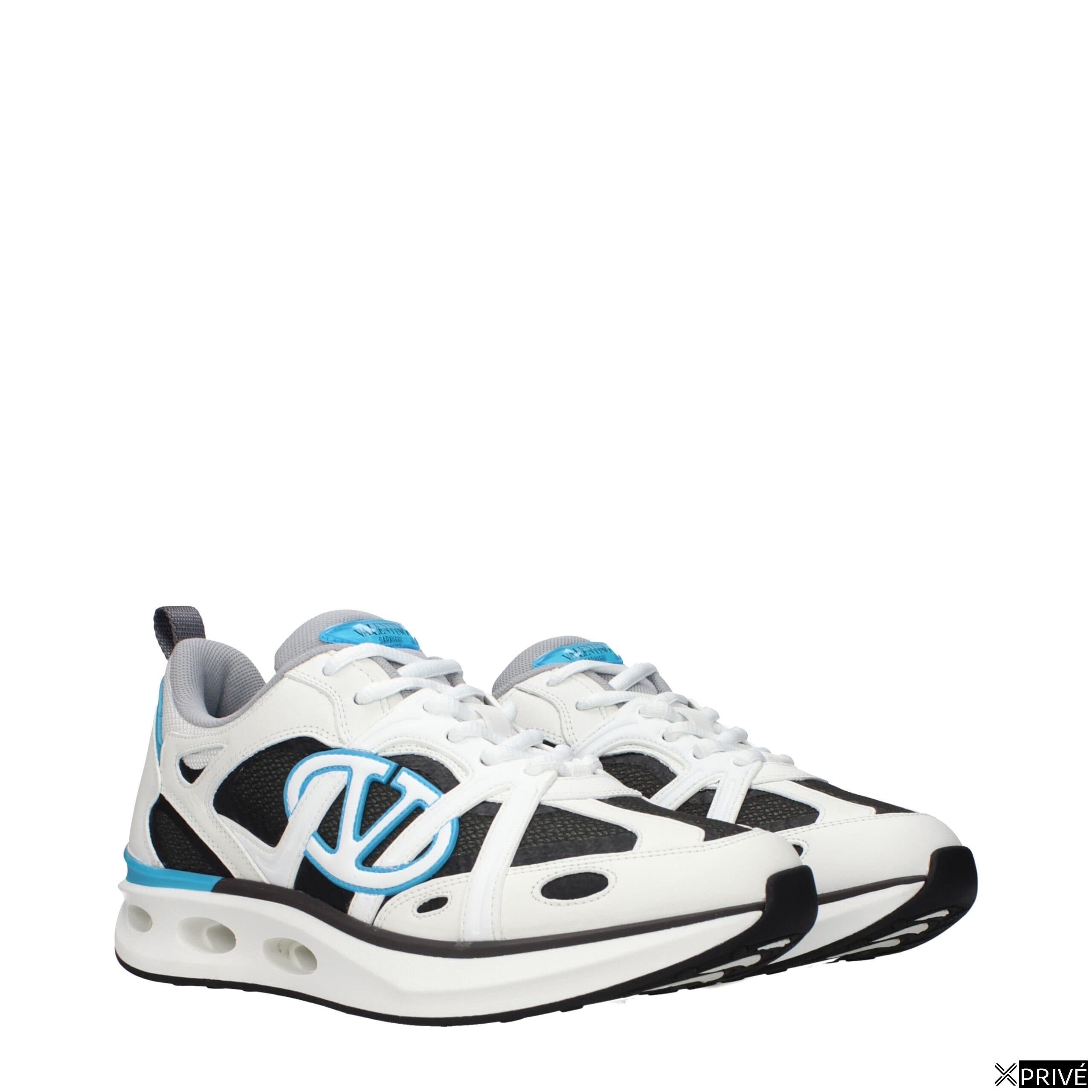 Chaussures de sport blanches en Tissu — 2