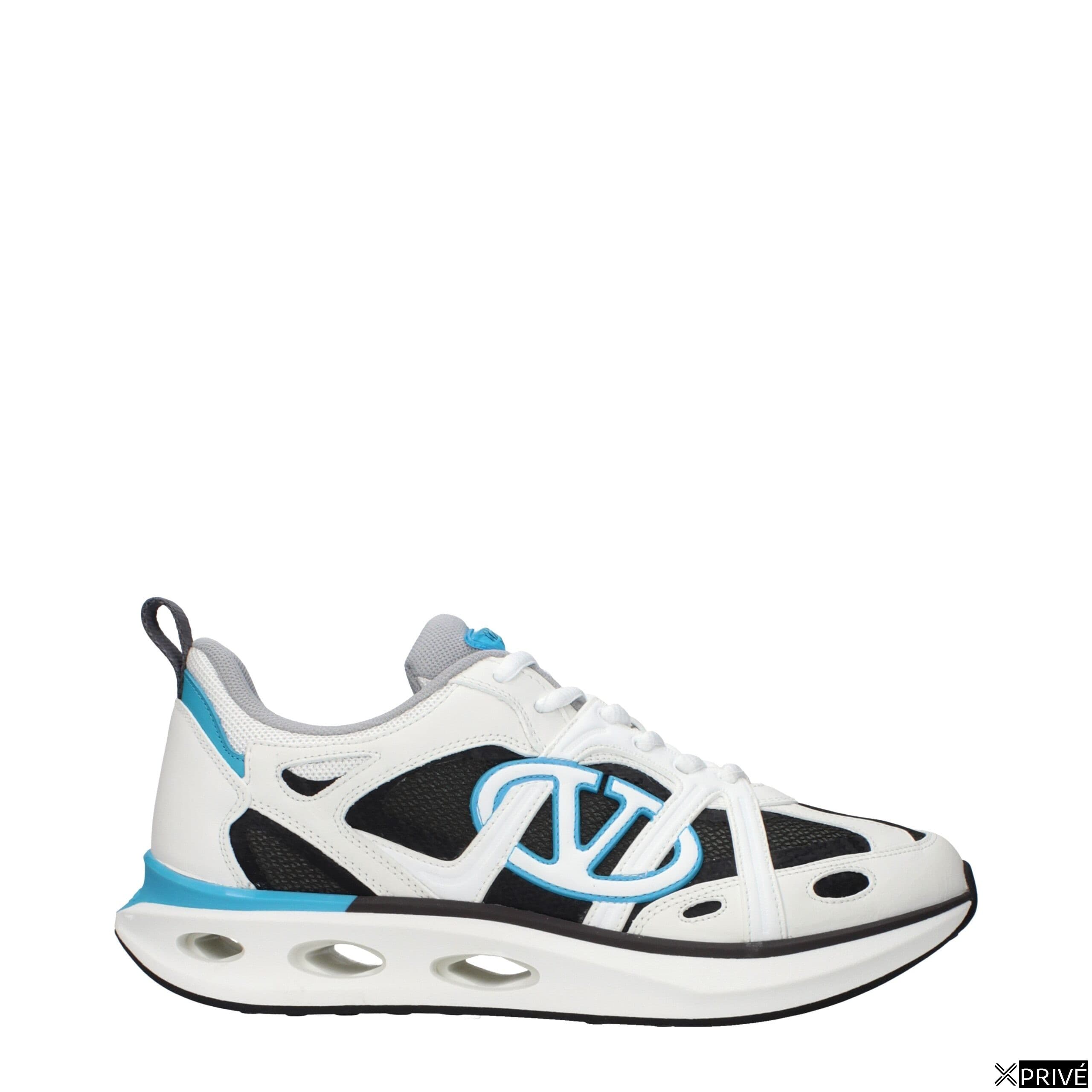 Chaussures de sport blanches en Tissu — 1