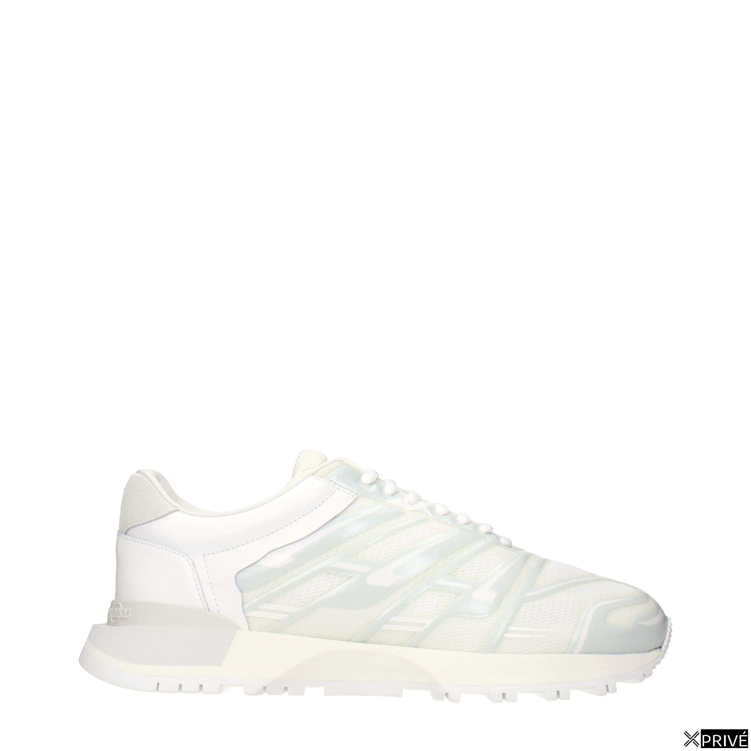 Chaussures de sport blanches en Tissu — 1