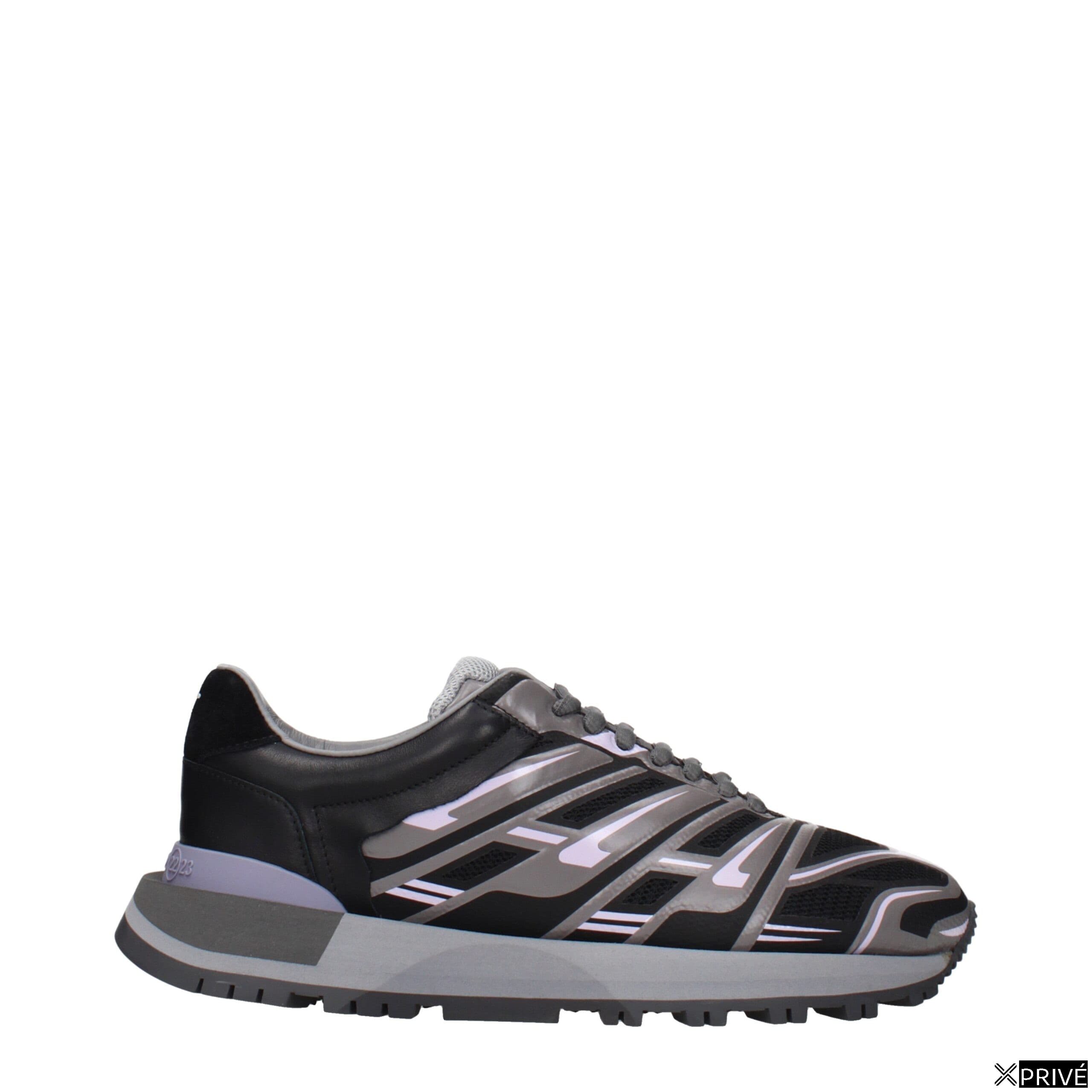 Chaussures de sport noires en Tissu — 1