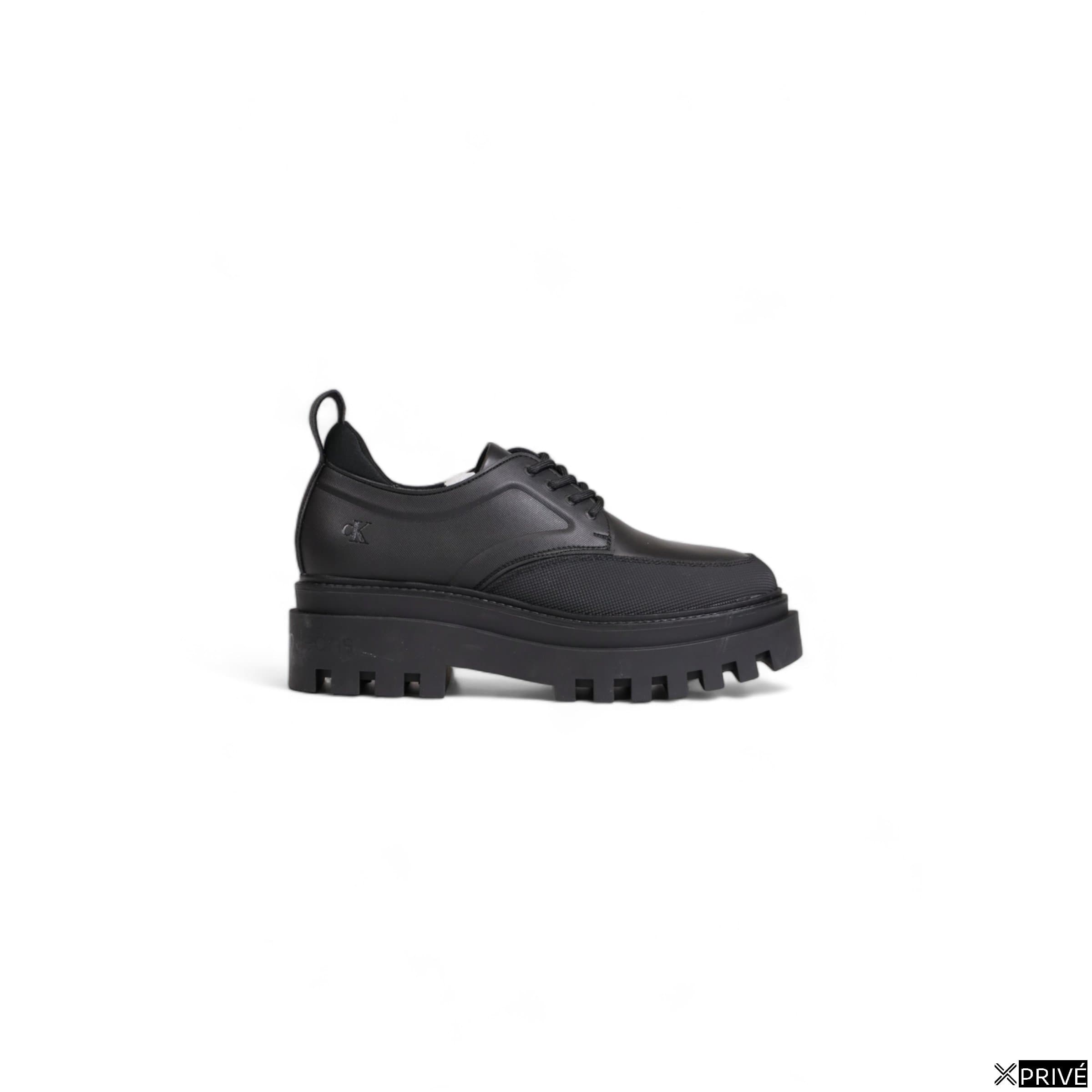 Chaussure à lacets noires — 1