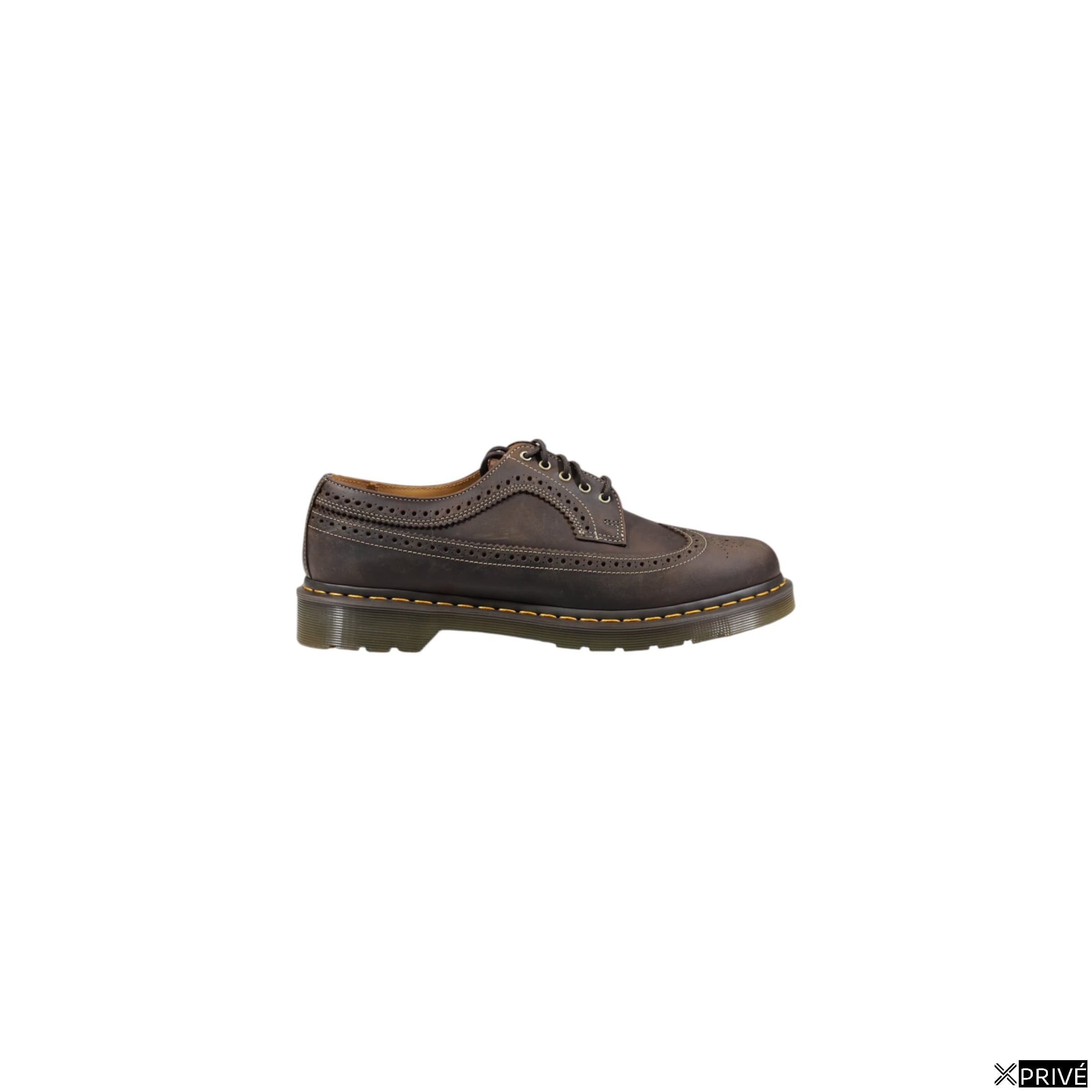 Chaussure à lacets brunes — 1