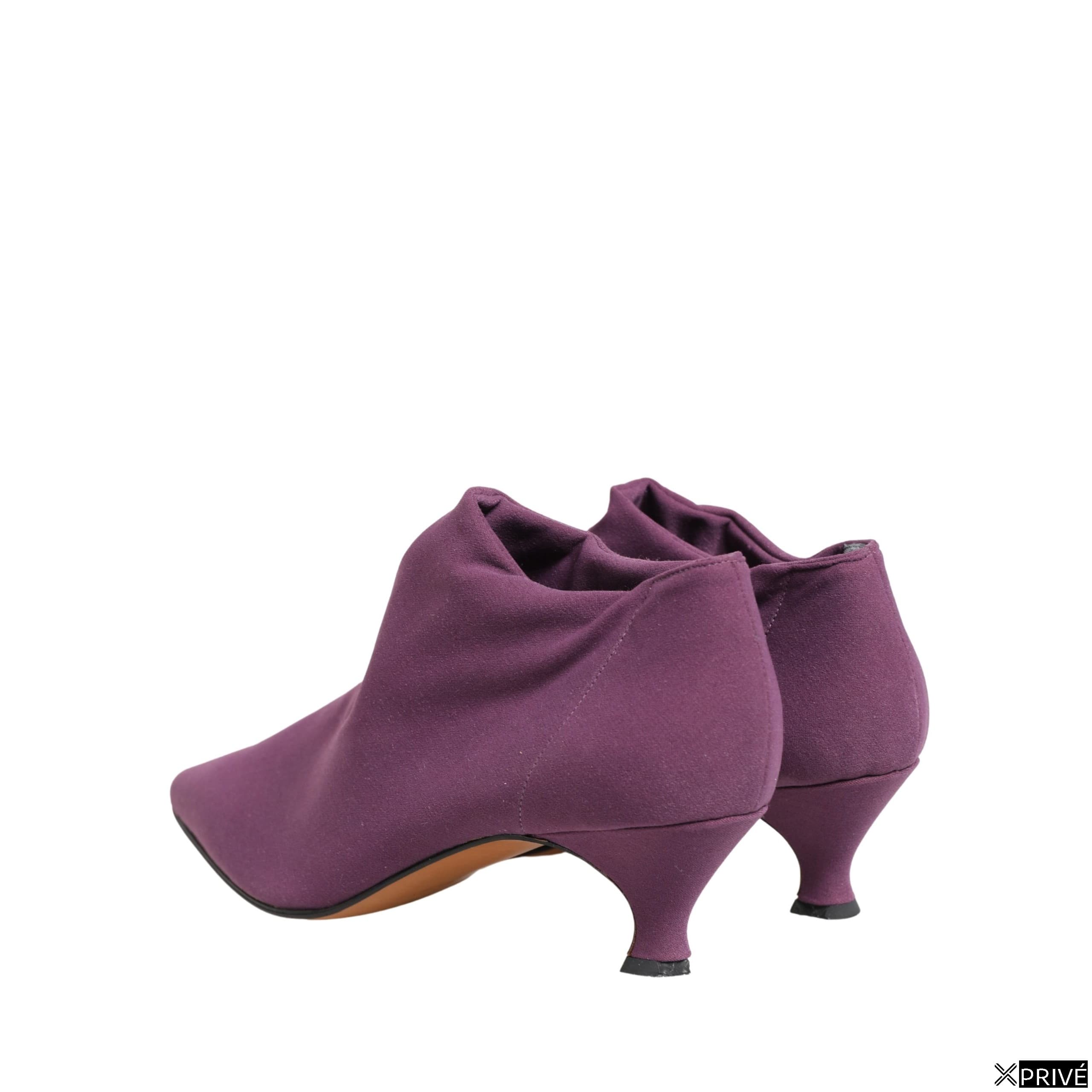 Bottes violettes — 6