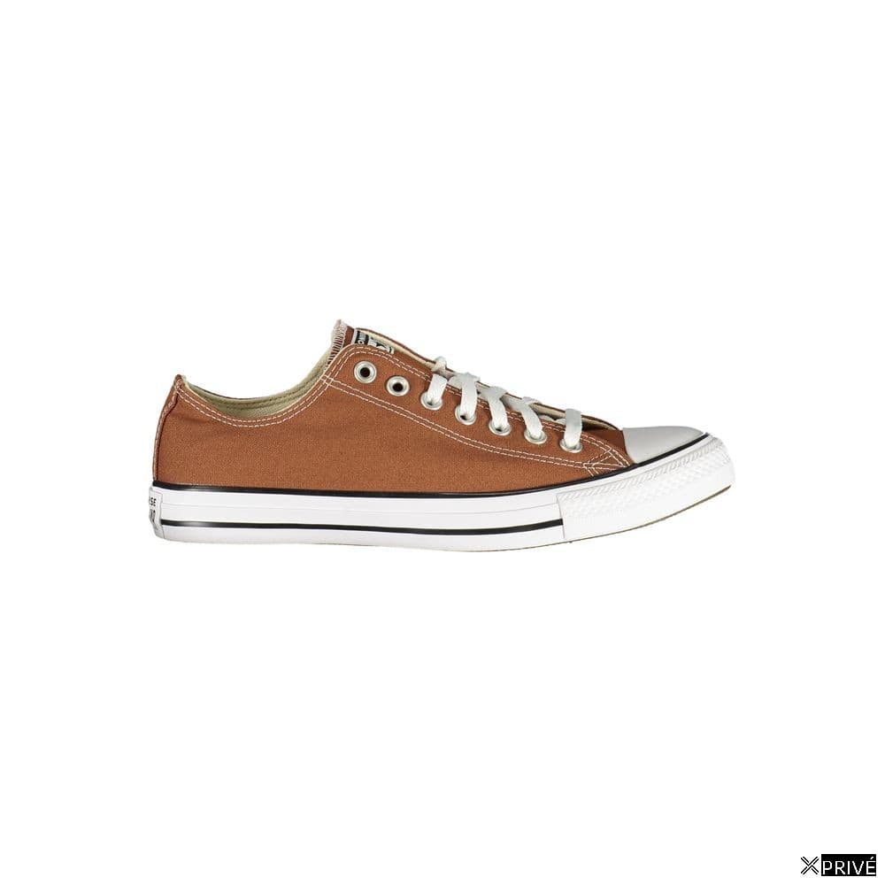 Chaussures de sport brunes — 1