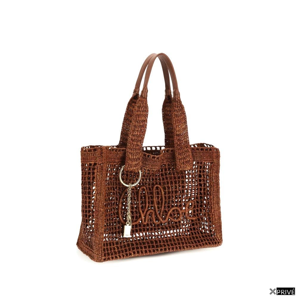 Sac bandoulière brun en Raphia — 2