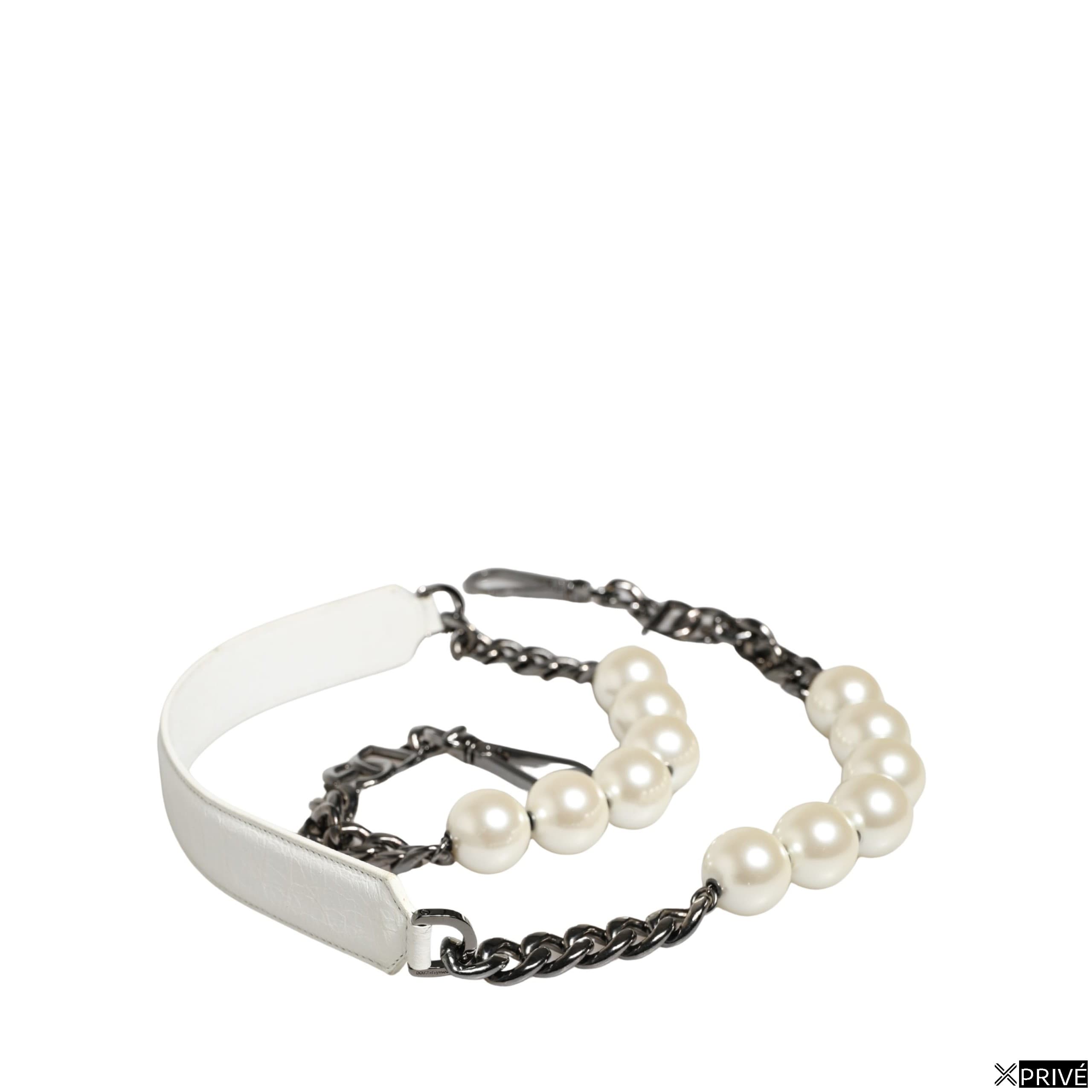 Accessoire en cuir blanc — 1