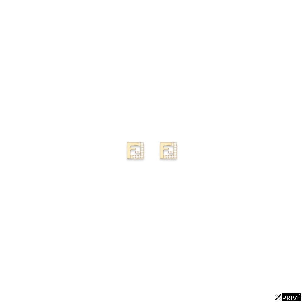 Boucle d’oreille dorée en Laiton — 1