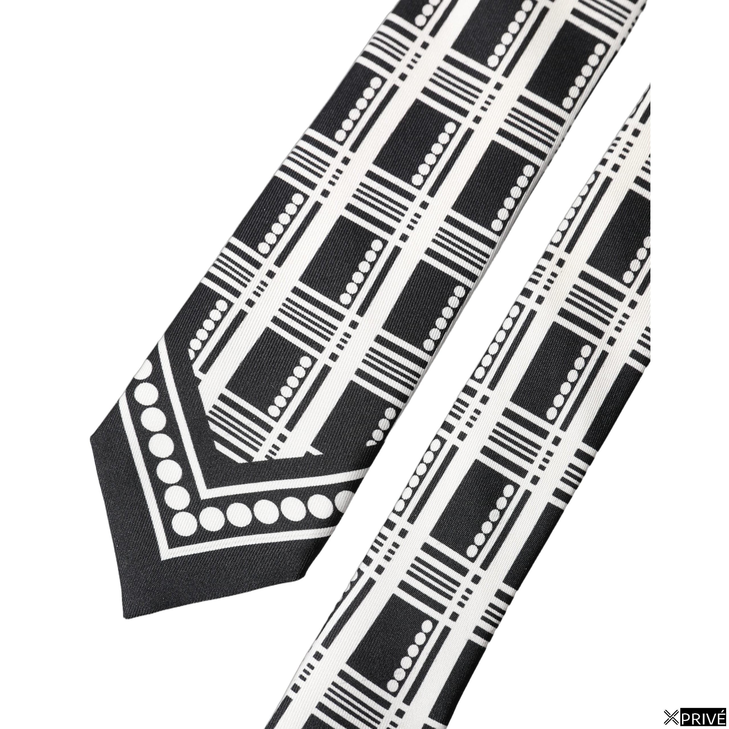 Cravate et nœud papillon noir et blanc — 5
