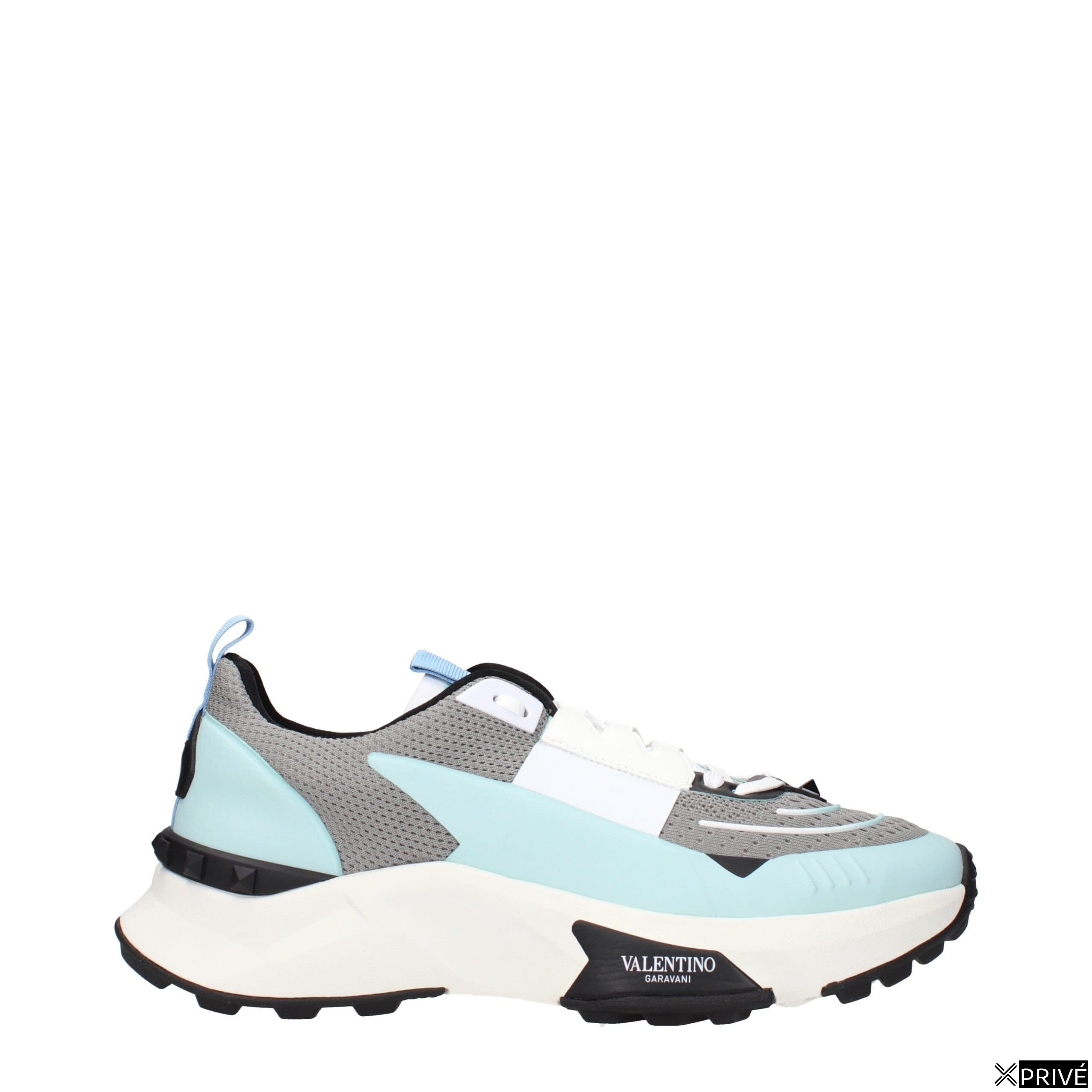 Chaussures de sport grises en Tissu — 1