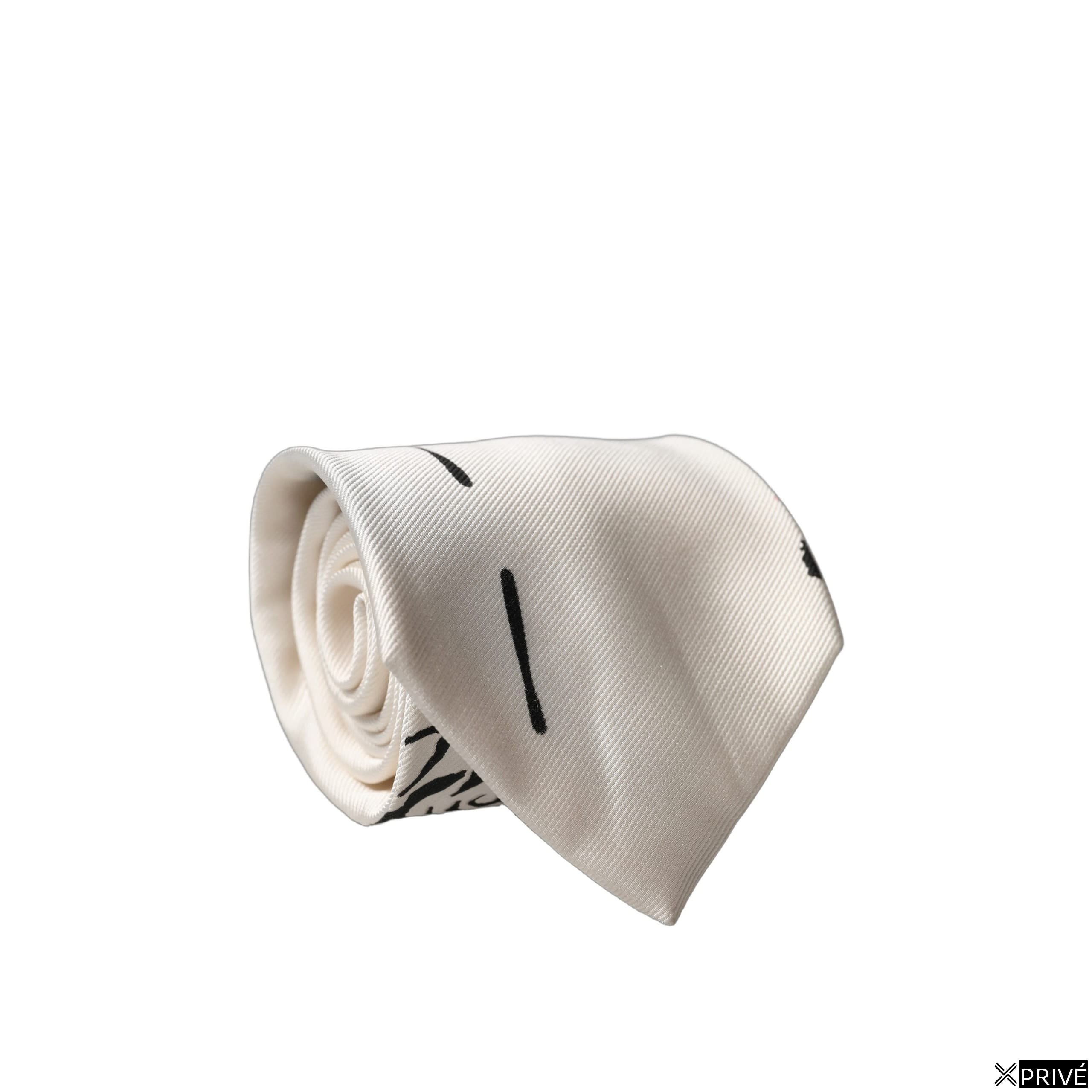 Cravate et nœud papillon blanc — 1