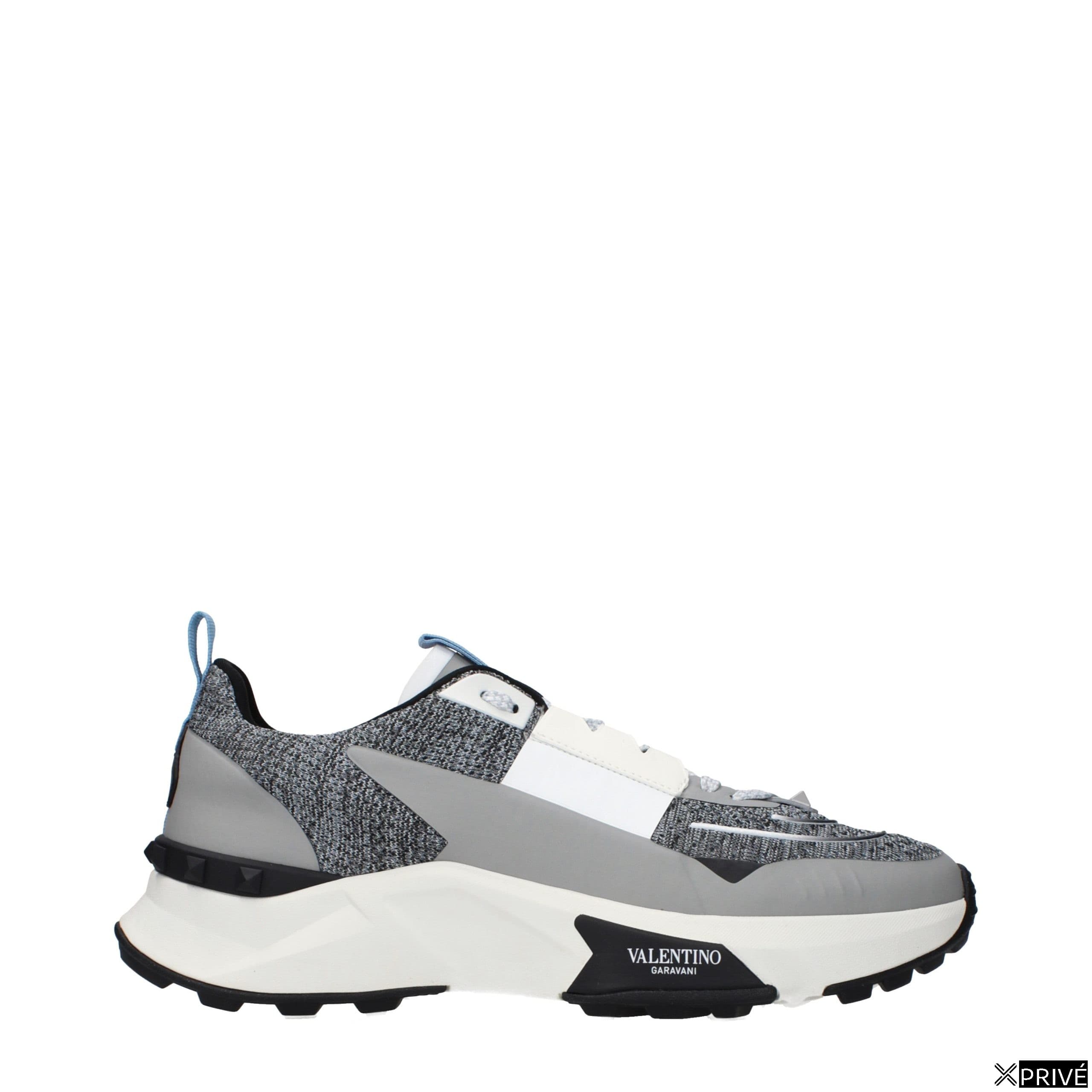 Chaussures de sport grises en Tissu — 1