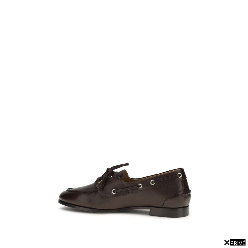 Chaussures brunes — 3
