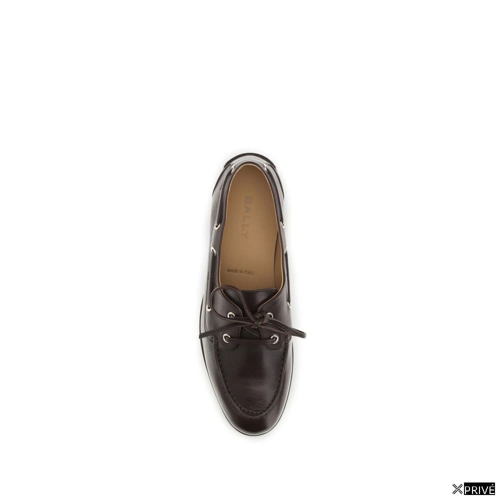 Chaussures brunes — 4