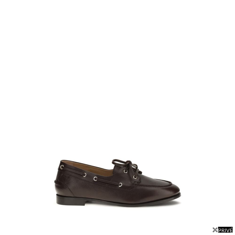 Chaussures brunes — 1