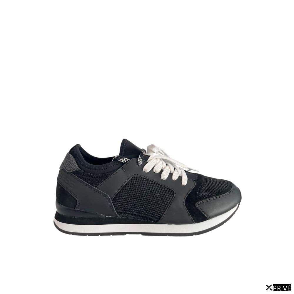 Chaussures de sport noires — 1