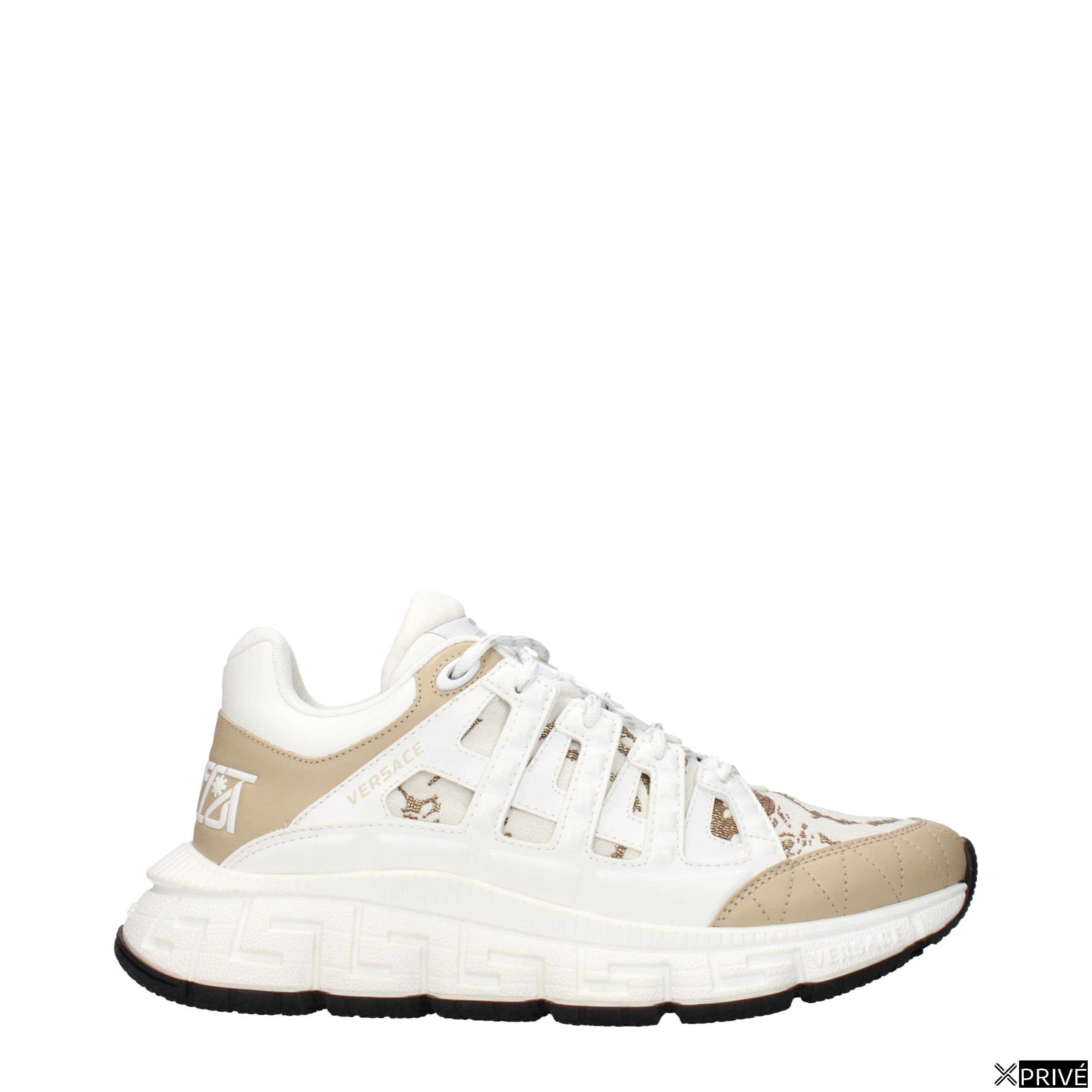 Chaussures de sport blanches en Tissu — 1